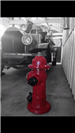 Fire Hydrant Next to Old Fire Truck