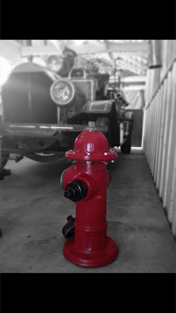 Fire Hydrant Next to Old Fire Truck